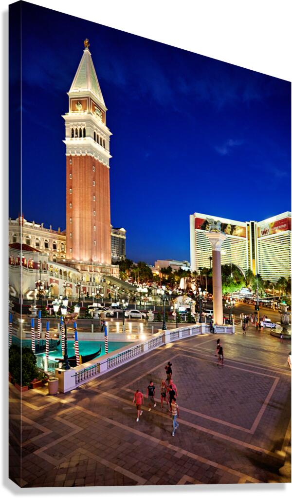 Venetian Hotel at sunset with visitors in Las Vegas
