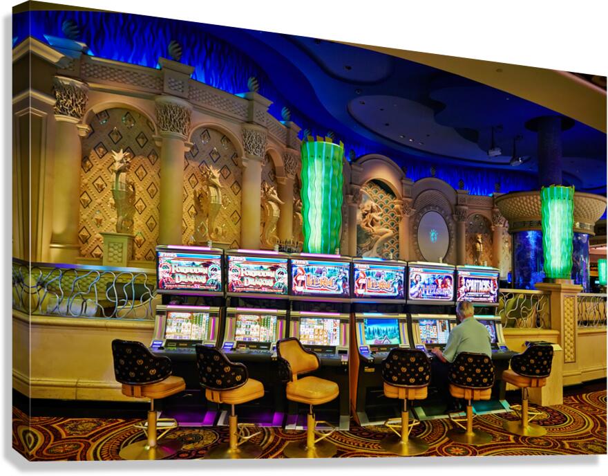 Gaming at slot machines in Caesars Palace Casino in Las Vegas