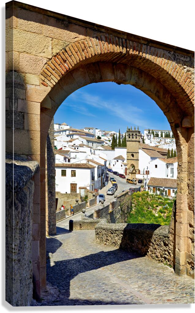 Views of Ronda in Andalusia Spain through an arch