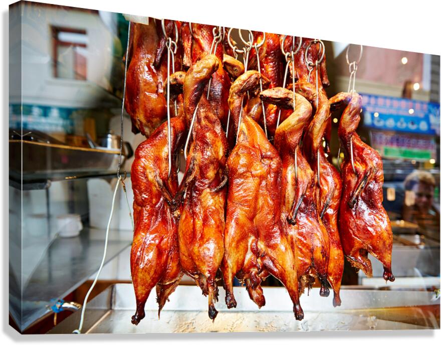 Hanging roast ducks in SFs Chinatown market