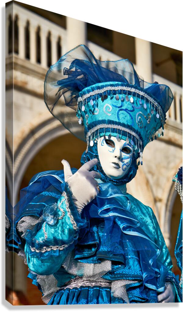 People in blue masks at Venice Carnival in Italy