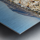 Santorinis white buildings on caldera cliffs above the sea. Metal print