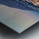 Santorini cliffside town at sunset with mountain backdrop. Metal print