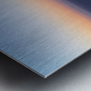 Santorinis Oia village glows at twilight by the sea. Metal print