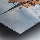 Historic brick building with a tower and people walking. Metal print