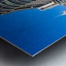 Modern curved building with balconies and city skyline. Metal print