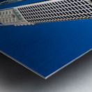 Woman walks on stairs in modern urban area with tall buildings Metal print