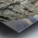 Serene stone faces adorn ancient Cambodian temple. Impression metal