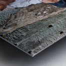 Elderly person selling goods at ancient temple ruins. Metal print