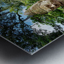 Ancient stone statues line path to Angkor Thom gate. Metal print