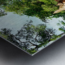 Ancient stone temple complex surrounded by lush jungle and water Metal print