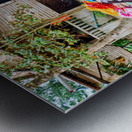 Monk with colorful textiles on a motorcycle. Metal print