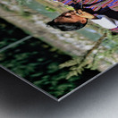 Bhutanese archer in traditional Gho aiming a compound bow. Metal print