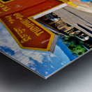 Colorful Bhutanese signpost directs to Thimphu and Trashigang. Metal print