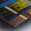 Smiling young monk in red robes at colorful traditional building Metal print