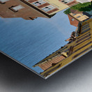 Visitors stroll by timber framed houses along the canal in Colma Metal print