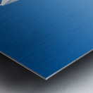 Burj Al Arab hotel stands tall by the water with palm trees Metal print