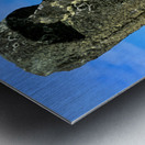 Iconic Moai statue stands tall on Easter Island. Metal print