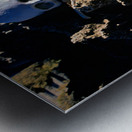 Human skeleton partially buried in rocky terrain. Metal print