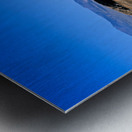 Arid desert with unusual rock pillars against a blue sky. Metal print