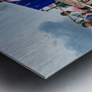 Workers rest during break time at a construction site in Lahore Metal print