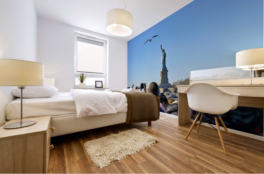 New York. Manhattan. United States. Tourists approaching Liberty Island by ferry Mural print