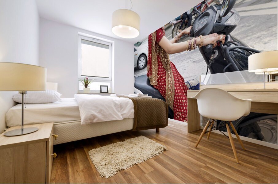 India Rajasthan Udaipur. A beautiful smiling girl on a scooter Mural print