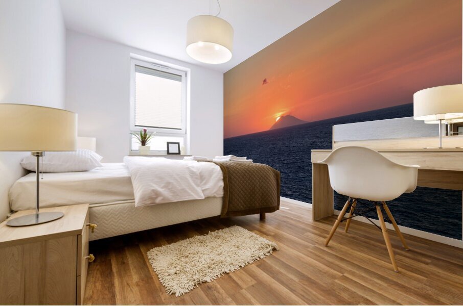 Tropea Calabria Italy. The sun sets in the crater mouth of Stromboli volcano Mural print