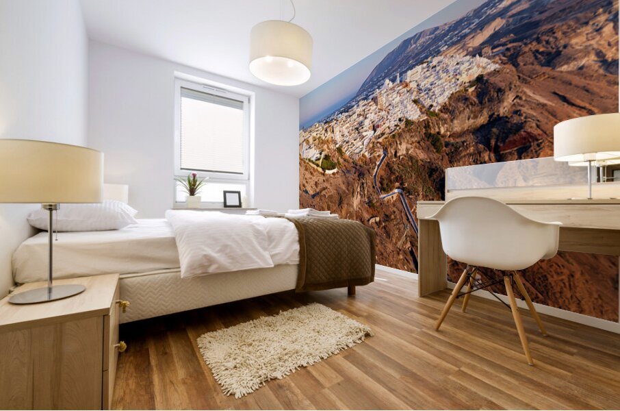 Santorinis Fira town on caldera cliff at sunset. Mural print