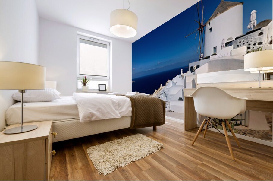 Santorinis iconic white architecture and windmill against the d Mural print