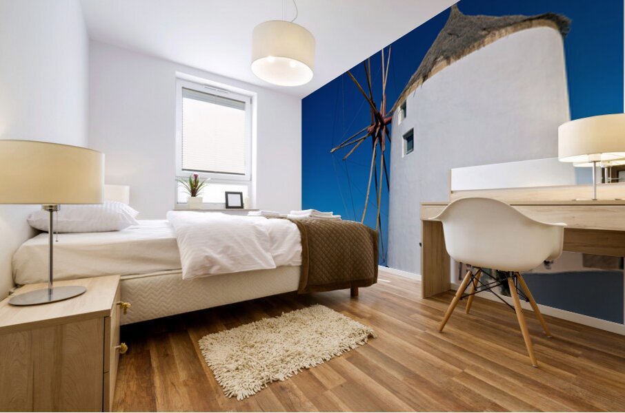 Santorini windmill and white architecture overlooking the blue s Mural print