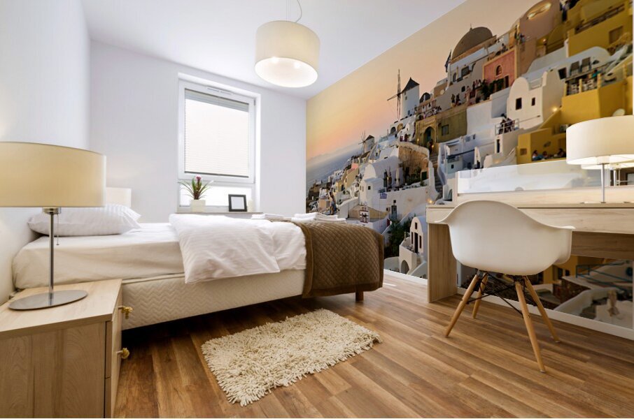 Whitewashed Santorini village and windmills at sunset over the s Mural print
