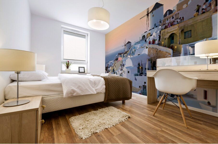 Oia Santorini: White buildings windmills and sunset over the  Mural print