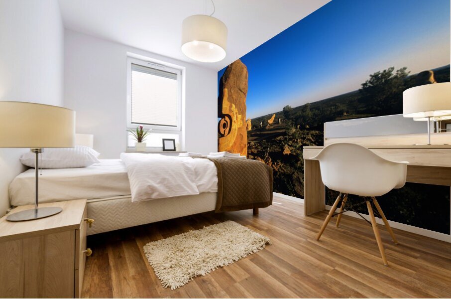 Sandstone sculptures glow at sunset in the Australian outback. Mural print