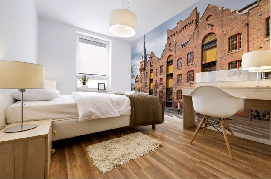 Historic brick building with a tower and people walking. Mural print