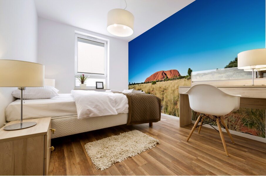 Uluru Australias iconic sandstone monolith under a clear blue Mural print