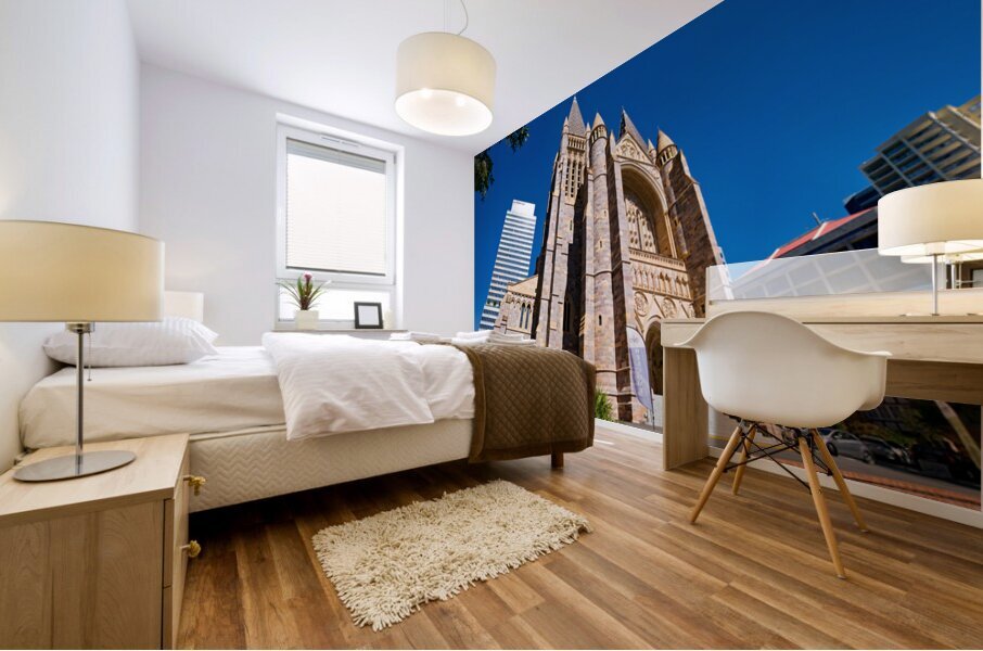 Historic church stands tall next to modern skyscrapers. Mural print