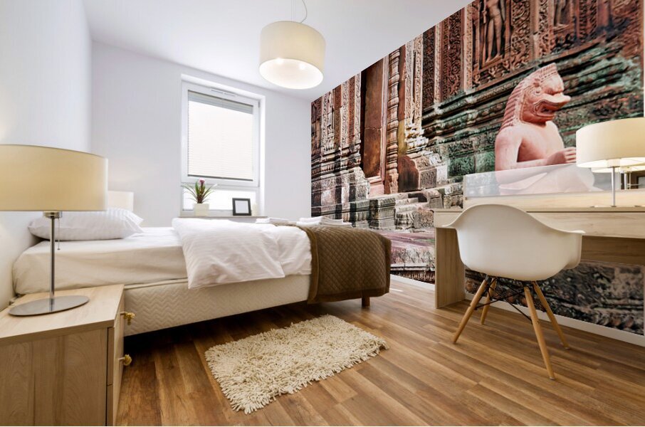 Ancient Cambodian temple with intricate carvings and guardian st Mural print