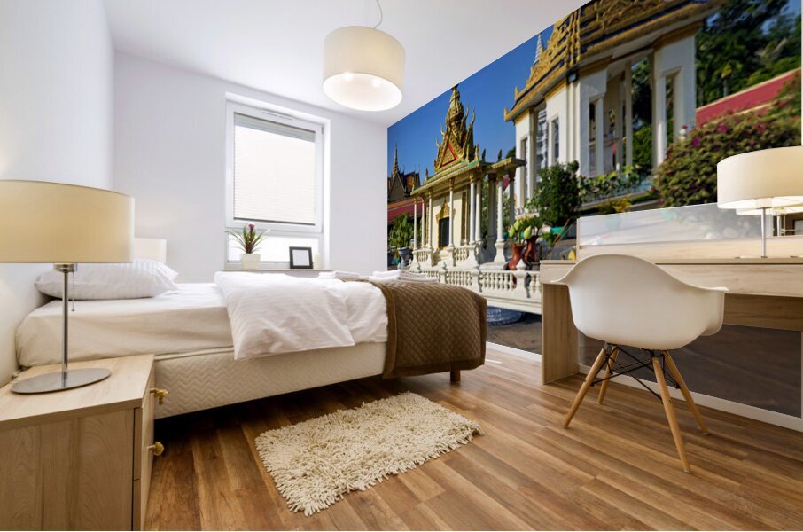 Golden shrine and temple buildings in Cambodia under blue sky. Mural print