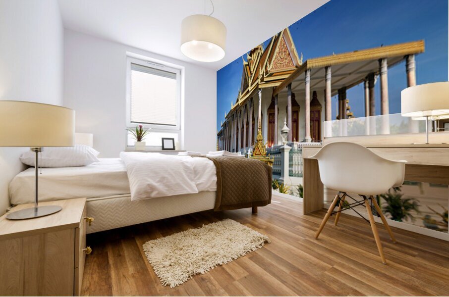 Majestic Cambodian temple under a blue sky with flying birds. Mural print