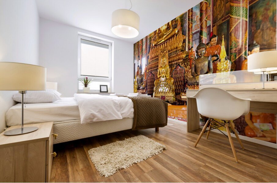 Golden Buddha statues and offerings in an ornate temple. Mural print