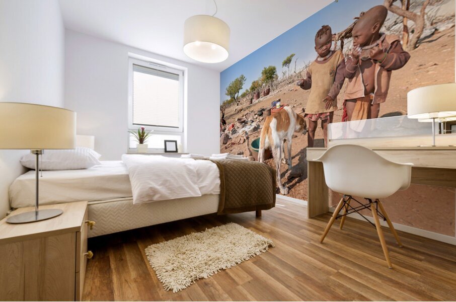 Children playing near their home in Himba Village in Namibia Mural print
