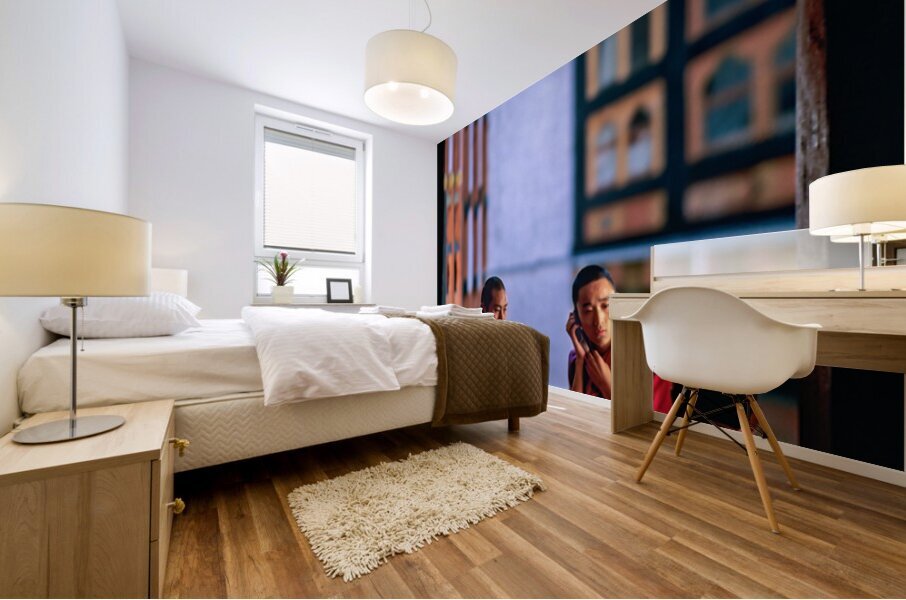 Bhutanese monks using a mobile phone. Mural print