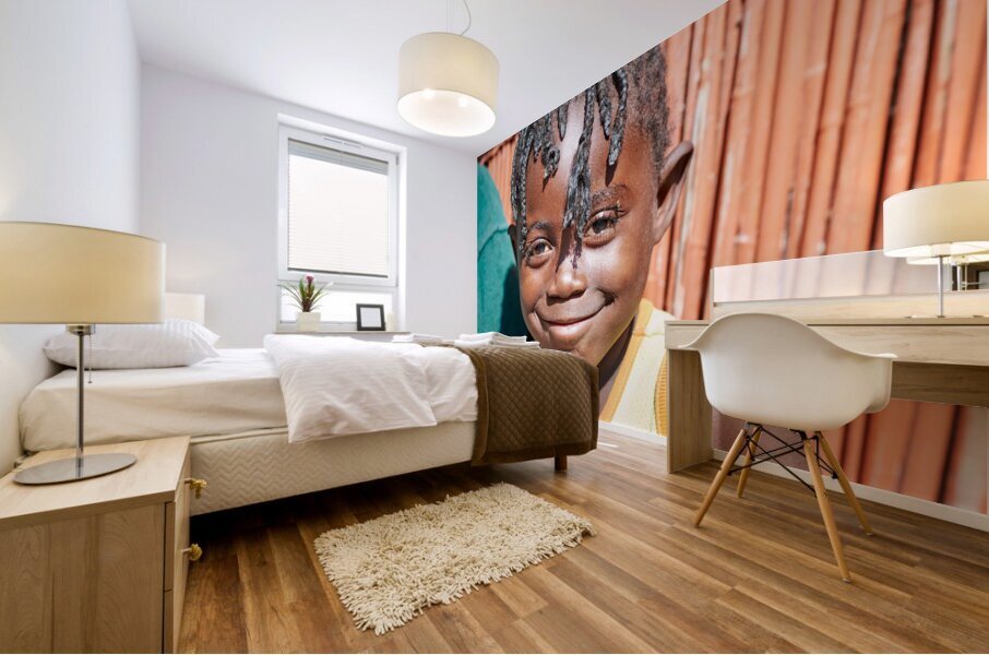 Joyful child smiles in Kavango Region of Namibia Mural print