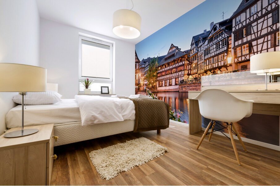 Evening in Petit France with timber framed houses by water Mural print