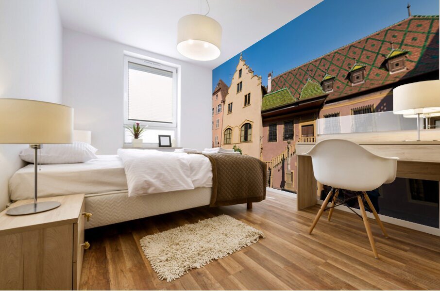 Visitors gather at Koifhus old custom house in Colmar Alsace Mural print