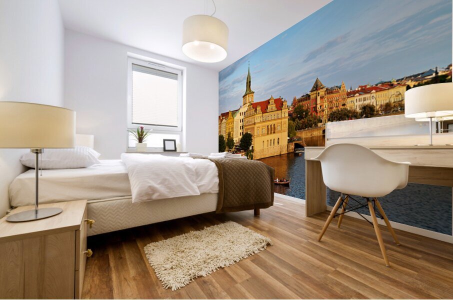 Sunset over Pragues Vltava River historic buildings and boat. Mural print