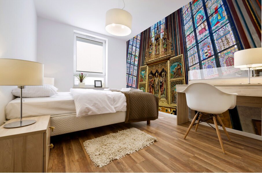 Ornate golden altarpiece and vibrant stained glass windows in a  Mural print