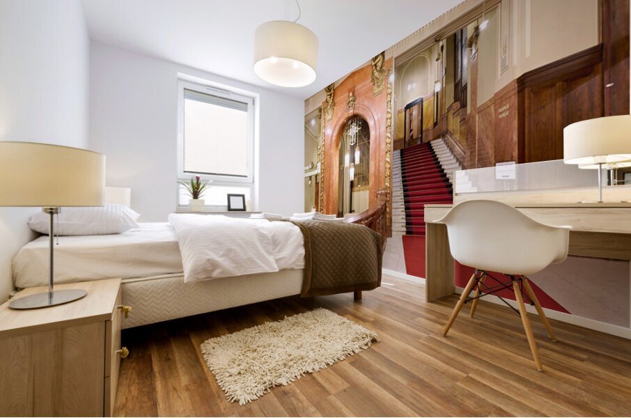 Elegant interior with red carpeted staircase and ornate gold det Mural print