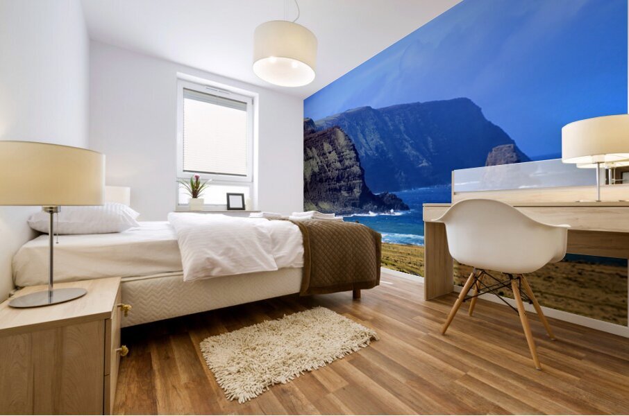 Moai statues on Easter Islands dramatic coastal landscape. Mural print